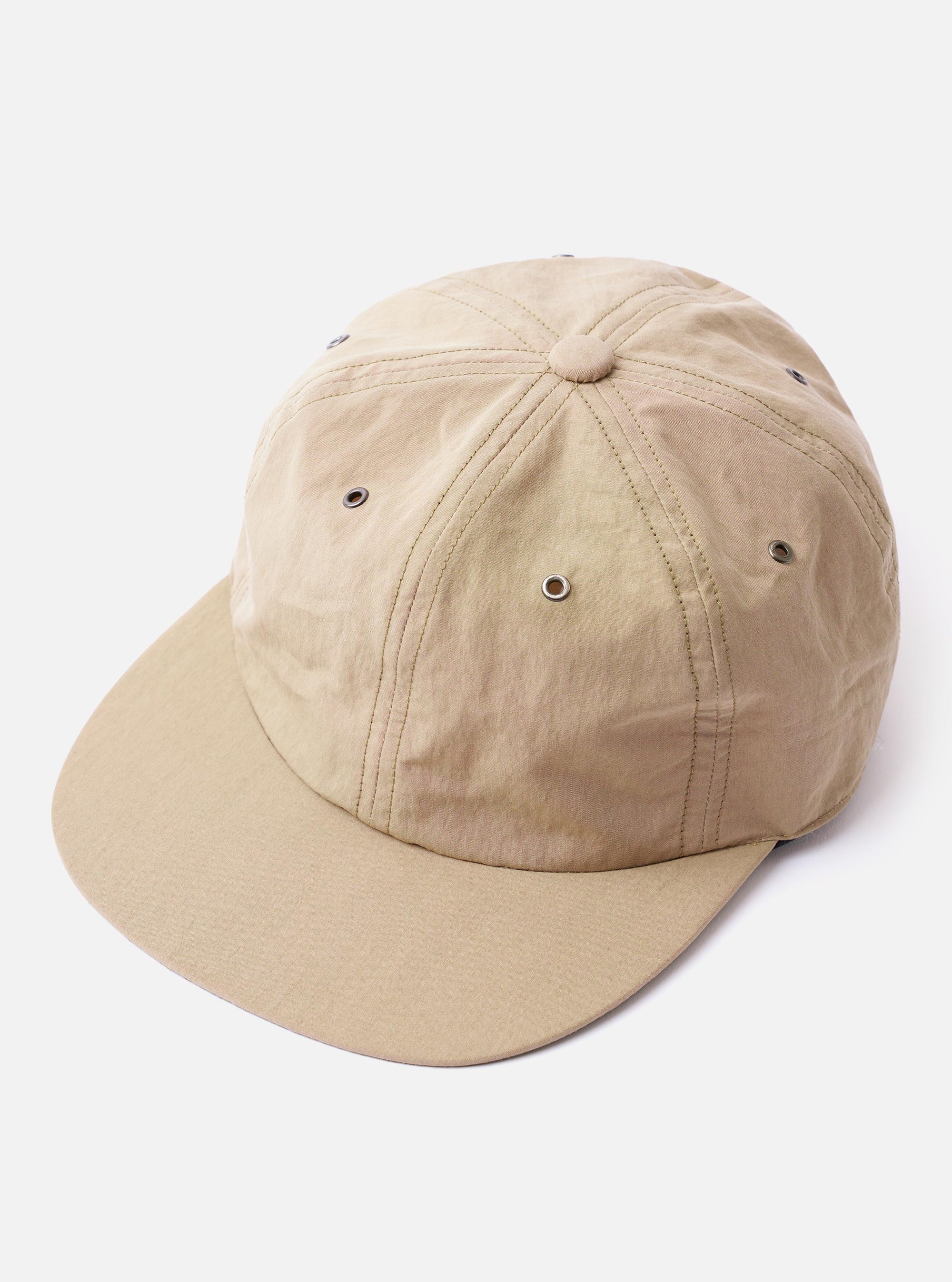The cableami Beige/Olive Cotton/Nylon B.B Cap is shown from the back as a flat lay against a plain white background. The image highlights the adjustable elasticated band at the rear and the clean six-panel construction. The fabric is a blend of beige and olive tones with visible eyelet details for ventilation.