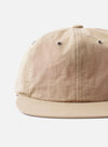 The cableami Beige/Olive Cotton/Nylon B.B Cap is shown from a rear angle as a flat lay against a plain white background. The image highlights the adjustable strap at the back and the panelled construction of the crown. The fabric is a smooth beige cotton-nylon blend with olive green detailing on the underside of the brim.
