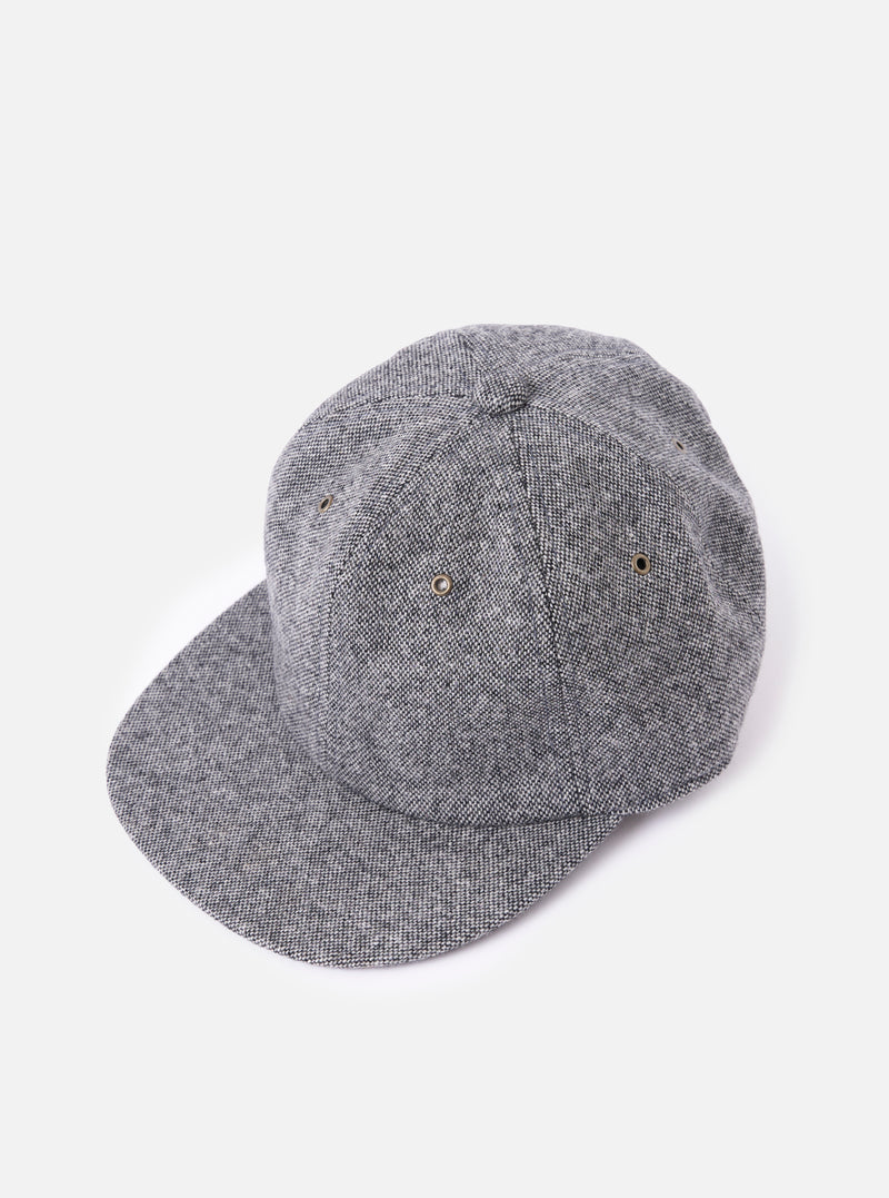 cableami® Black/White Recycled Tweed Cap on a white background. The cap is made of black and white tweed and has a classic fit.