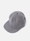 cableami® Black/White Recycled Tweed Cap on a white background. The cap is made of black and white tweed and has a classic fit.
