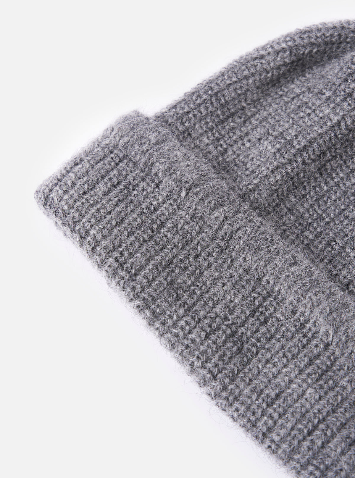 Close-up of the cableami® Grey Mohair Watch Cap on a white background. The soft, textured knit of the grey mohair is clearly visible.