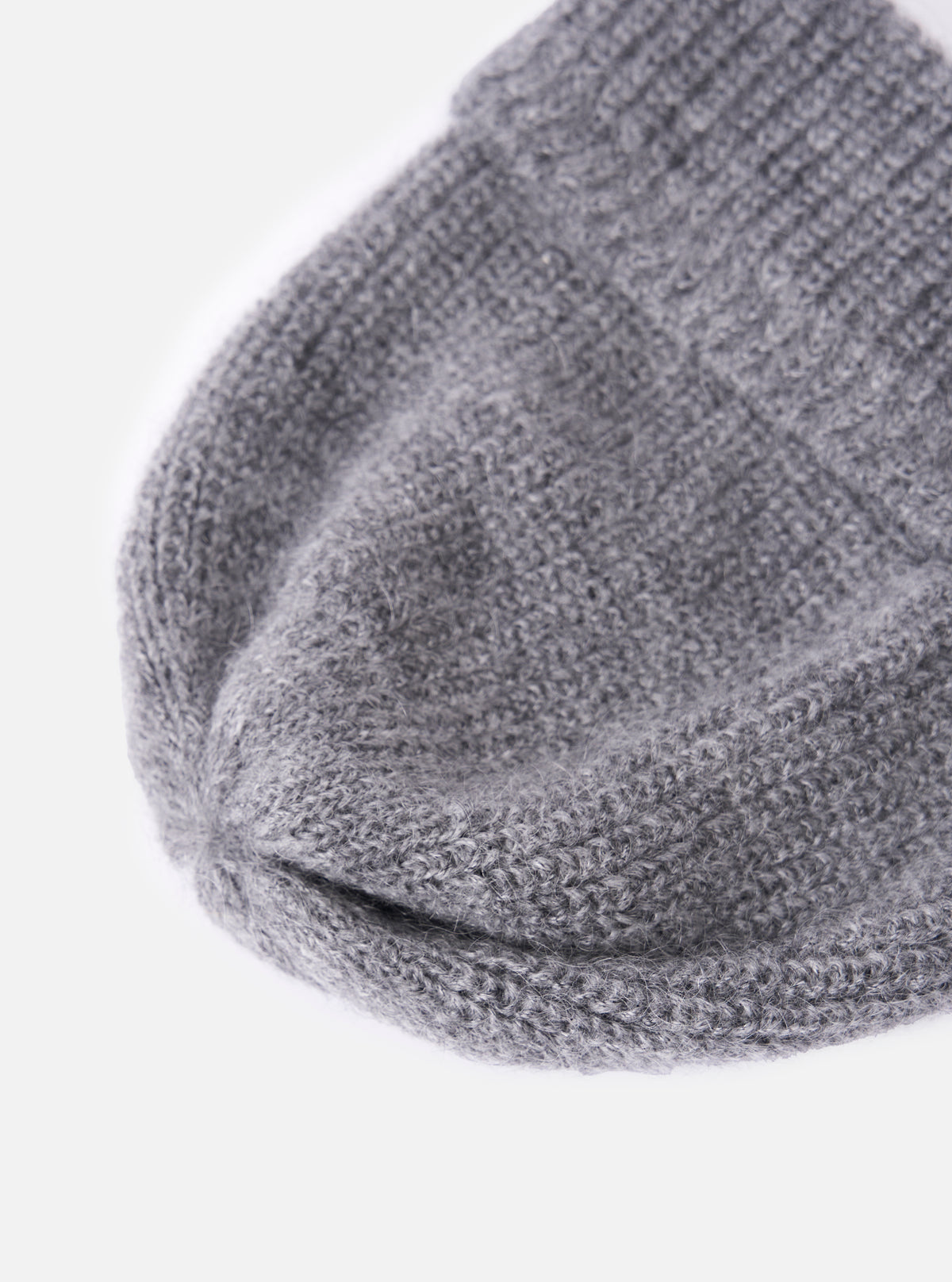 Close-up of the cableami® Grey Mohair Watch Cap on a white background. The soft, grey mohair knit is visible, showcasing the cap's texture and fit.