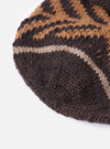 Close-up of a cableami® Brown Wool Jacquard Watch Cap on a white background. The cap features a brown and tan patterned knit.
