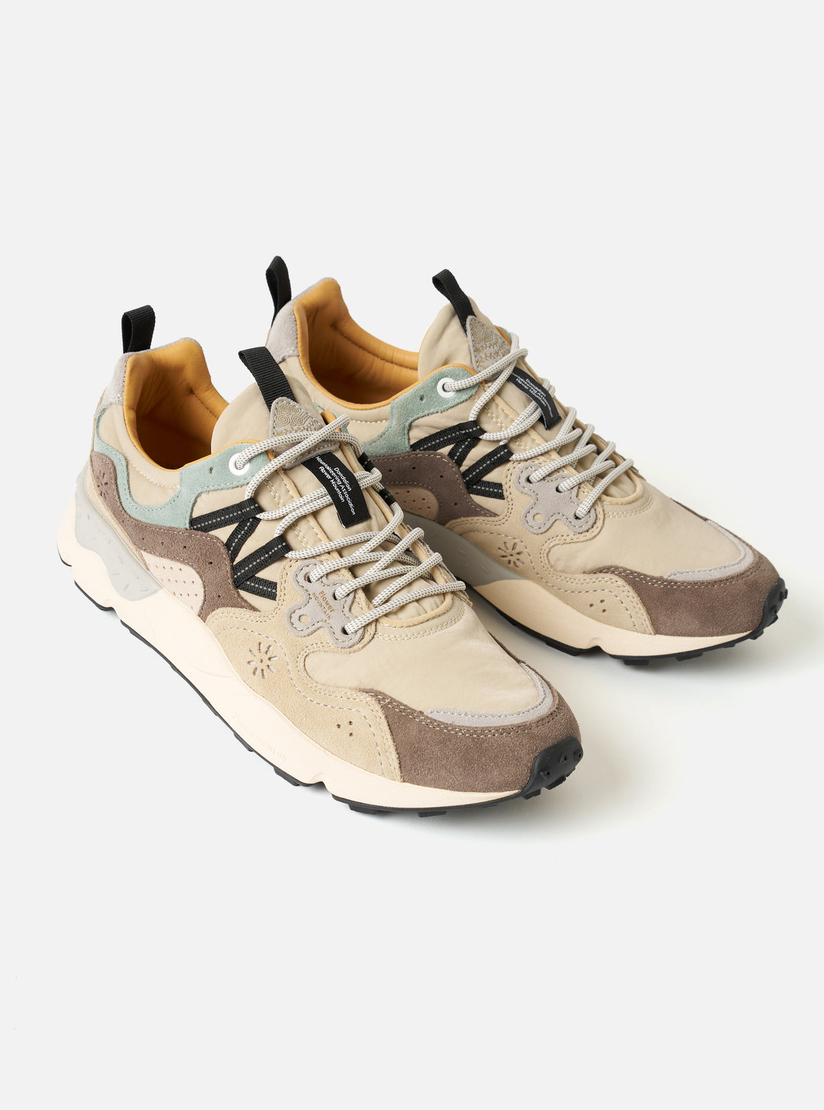 Top-down view of the Flower Mountain Sand/Beige/Taupe Cow Velour Yamano 3 Uni sneaker against a neutral studio background. Focuses on the lacing system, soft velour tongue, signature cork footbed, and rounded toe box paneling details.