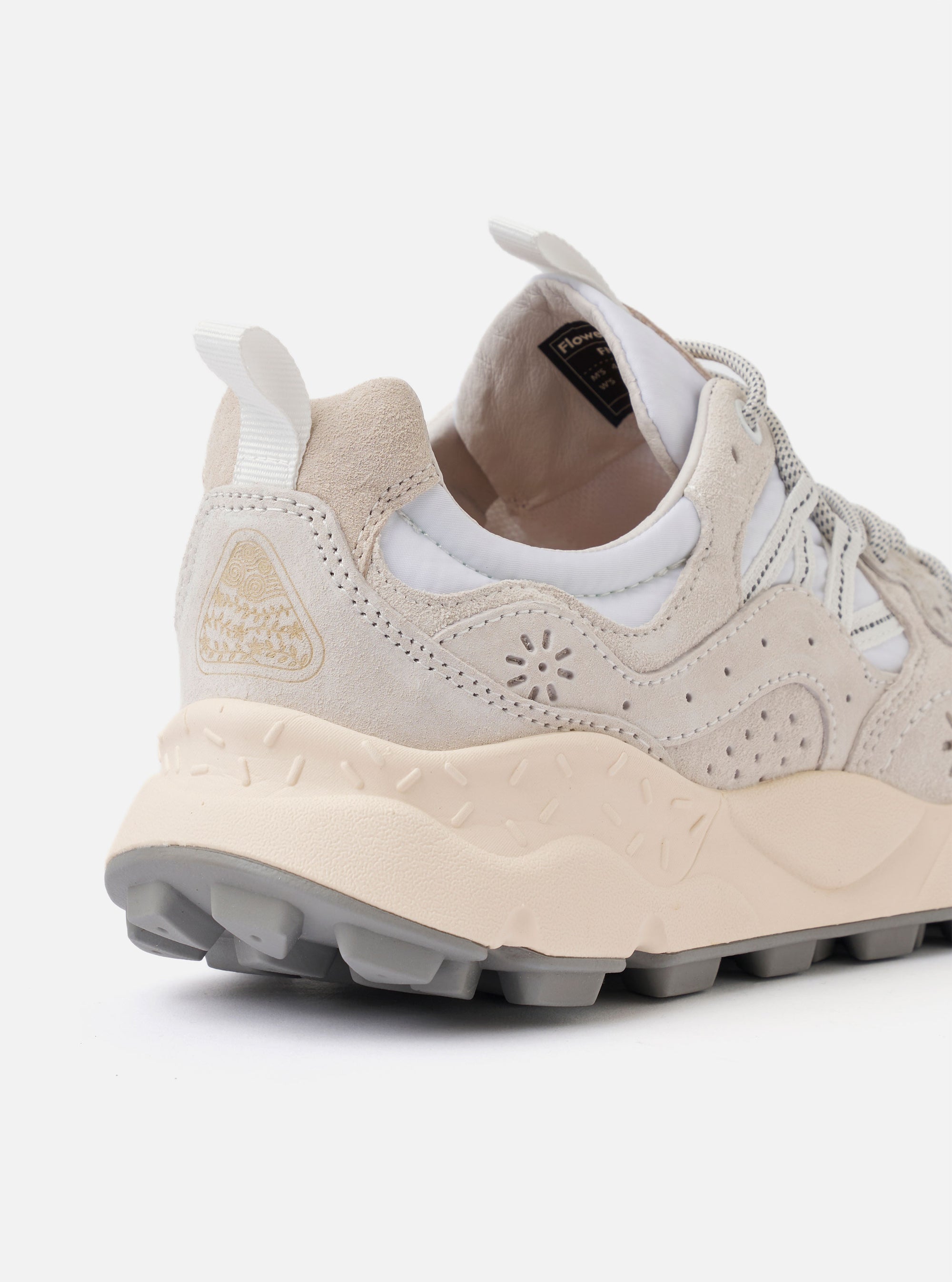 The Flower Mountain White/Off White Suede/Nylon Yamano 3 Uni is shown from a rear angle as a flat lay against a plain white background. The image highlights the reinforced heel with decorative perforations, the ultra-light rubber sole with a two-tone compound, and the indented toothed tread. The white nylon and off-white suede materials are clearly visible.