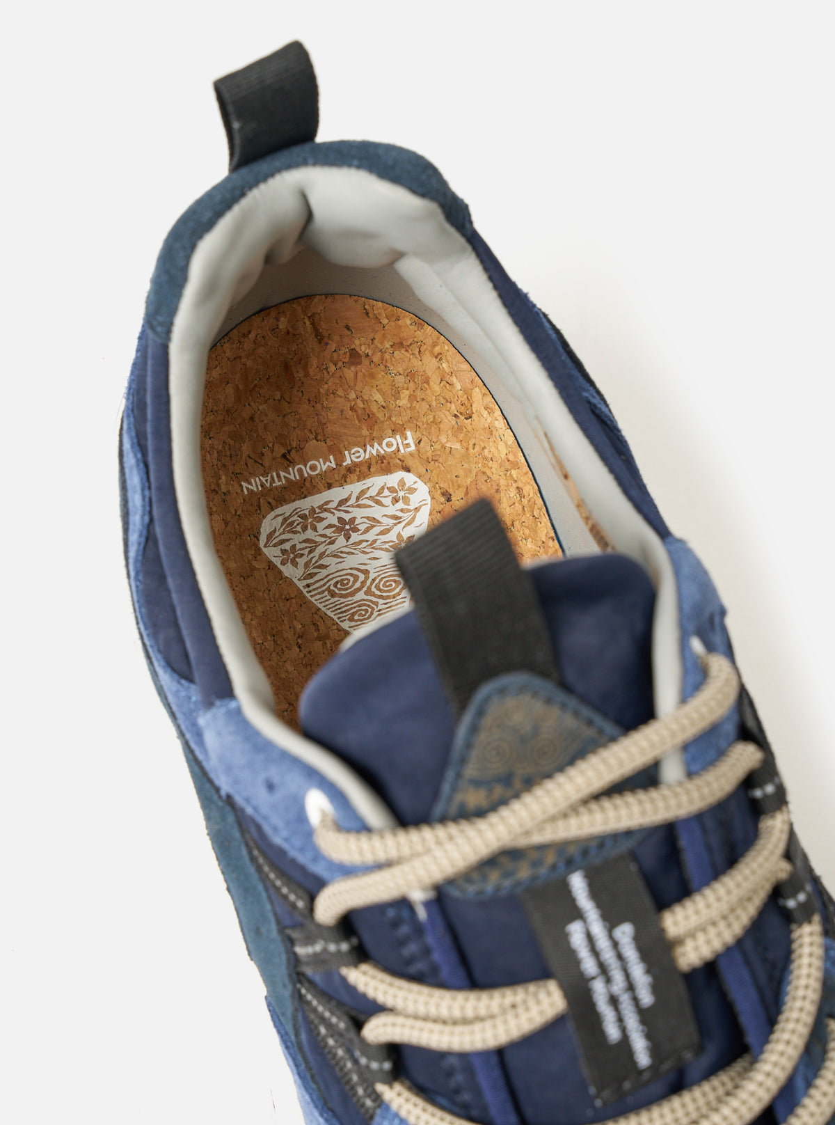Bottom sole view of the Flower Mountain Blue/Bluette Cow Velour Yamano 3 Man sneaker displayed on a light background. Features the deep tread rubber outsole designed for grip, contrast sole accents, and central brand logo engraving.