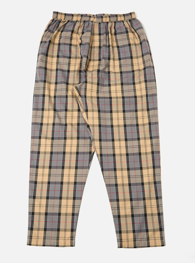 The Sand Tartan Check Pyjama Pant on a white background. The pants have a sand, gray, black, and red tartan pattern. The fit is loose and comfortable.