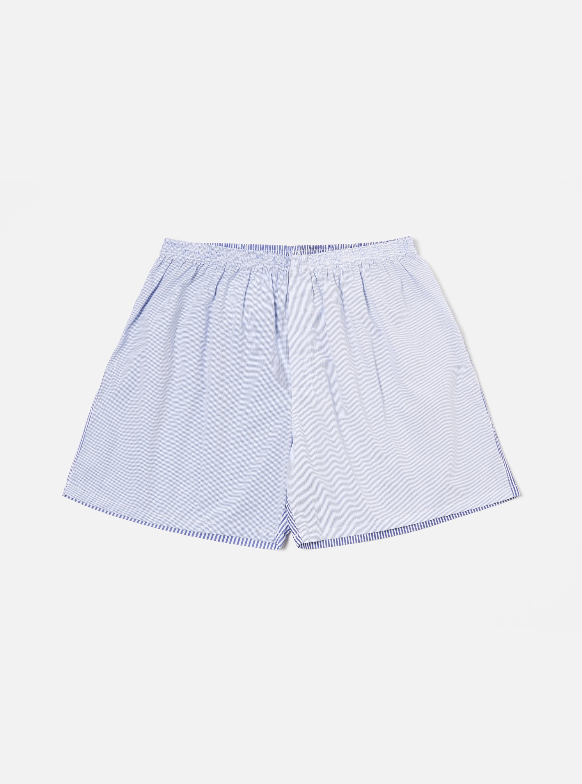 The Blue Classic Mix Boxer Short, laid flat on a white surface. The boxer short is blue and white striped, with an elastic waistband. The image is well-lit and in focus.