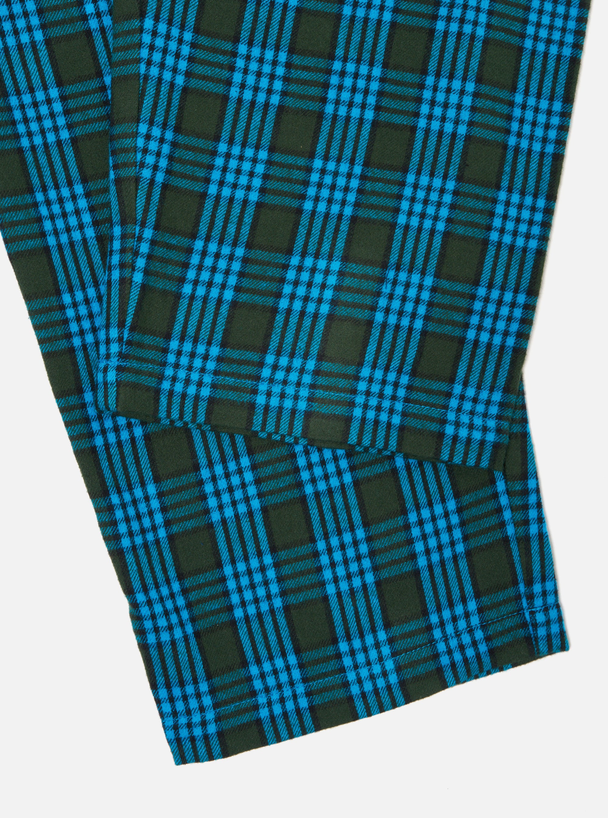 Close-up of the Blue Brushed Check Pyjama Pant on a white surface. The brushed check pattern features blue and dark green.