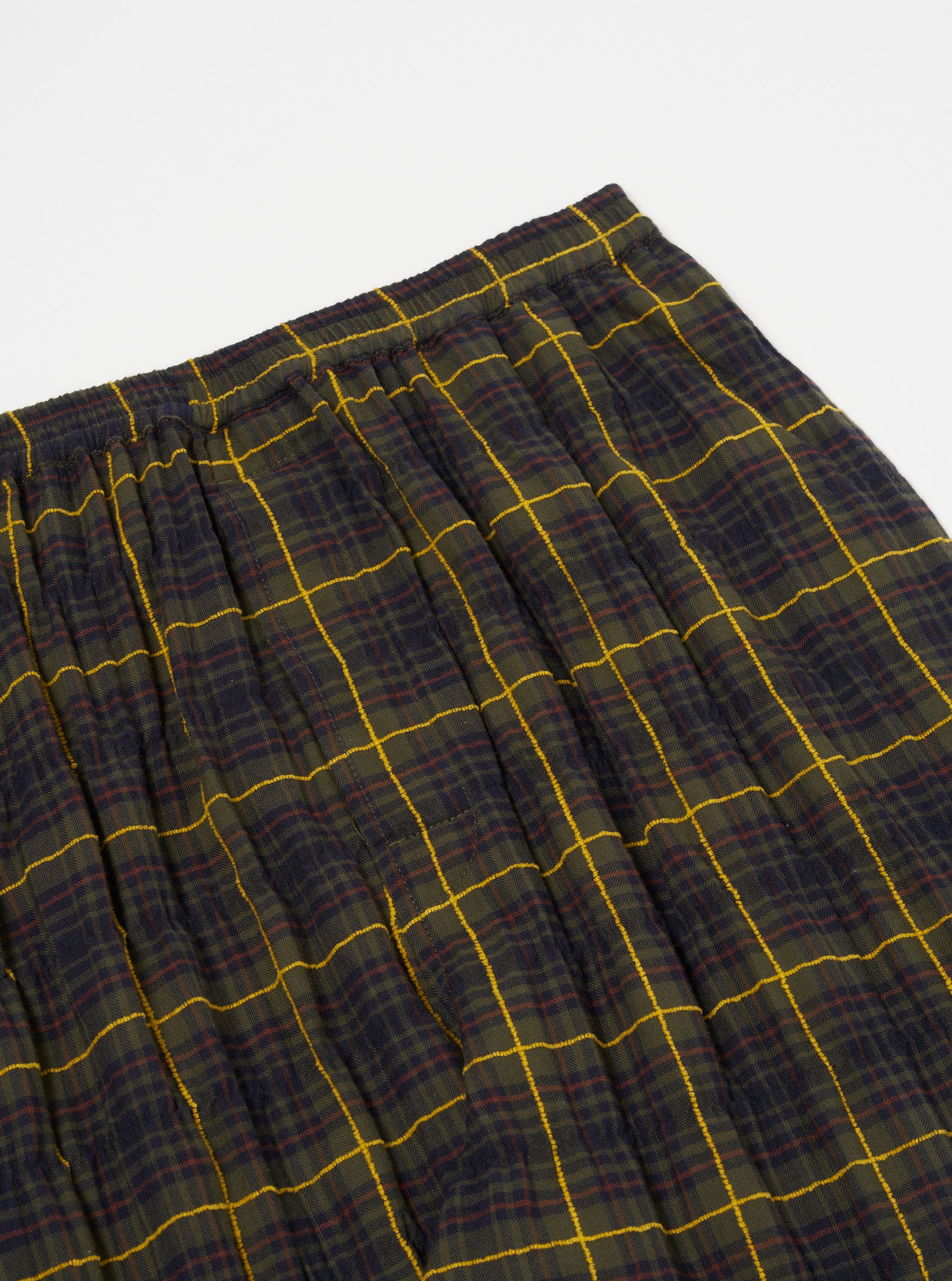 Close-up of Olive JP Herringbone Check Pyjama Pant on a white background. The relaxed fit pant features an olive, navy, and yellow herringbone check pattern.