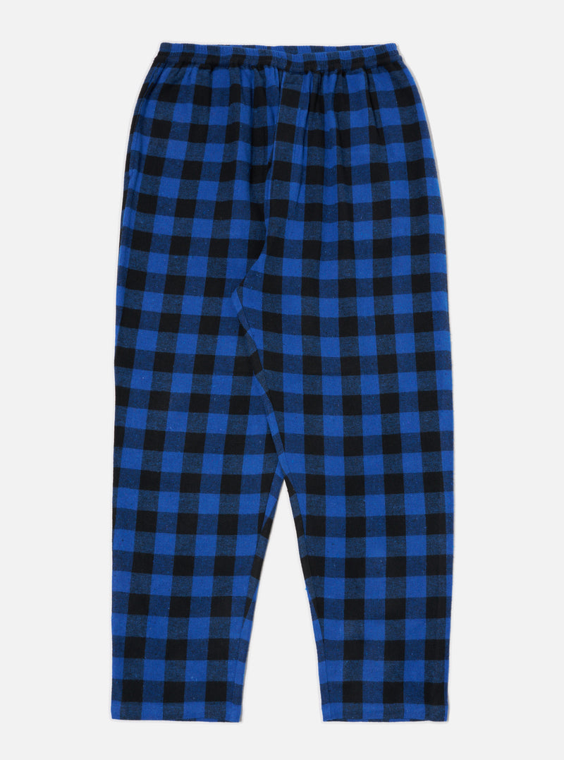 The Blue Brushed Bold Gingham Pyjama Pant on a white background. The pants are blue and black gingham, with an elastic waist. 