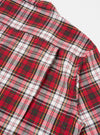 Close up of the Red Madras Check Short Pyjama Set. The fabric is red, white, green, yellow and black plaid. The set is on a white background.