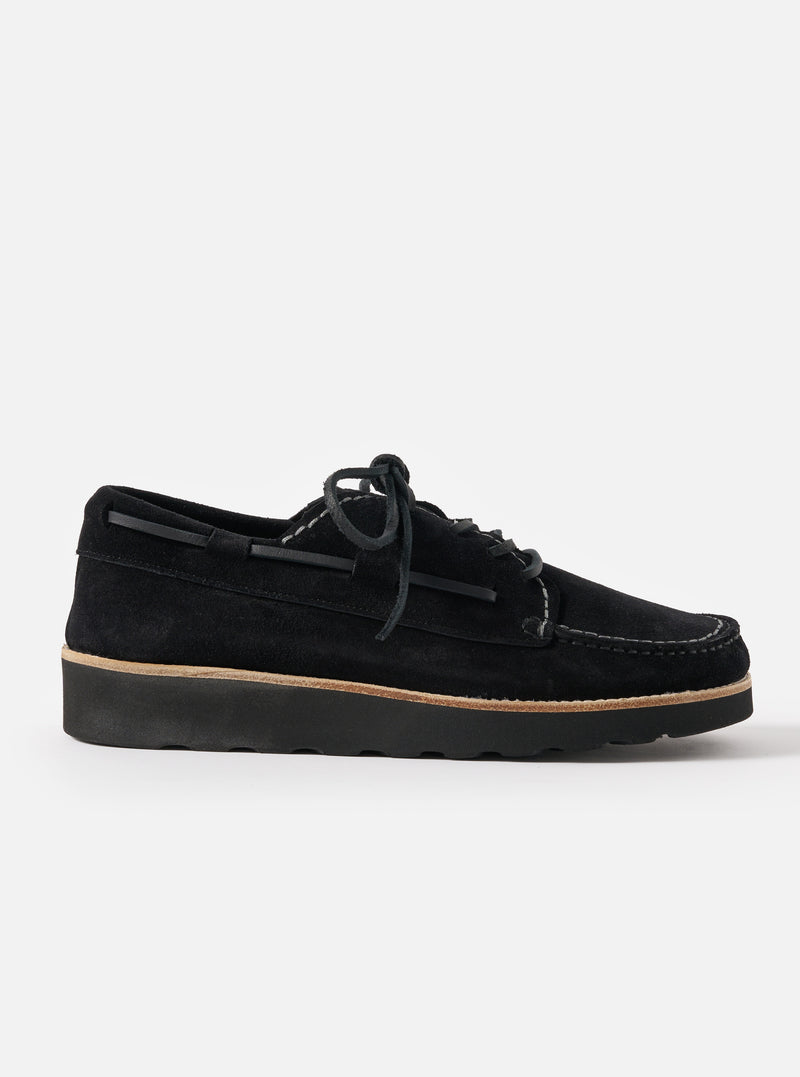 Studio shot of Zardus for Universal Works Black Suede Oliver shoe. The black suede shoe is on a white background.