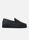 Side view of the Zardus for Universal Works Black Leather Reggie Loafer on a white background. The shoe is made of textured black leather with a chunky sole.