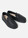 The Zardus for Universal Works Black Leather Reggie Loafer. Studio shot on white. Sleek black leather penny loafer with tonal stitching and a comfortable fit.
