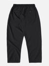 The Charcoal Tropical Suiting Oxford Pant in dark gray on a white background. The pants have a relaxed fit and visible back pockets.