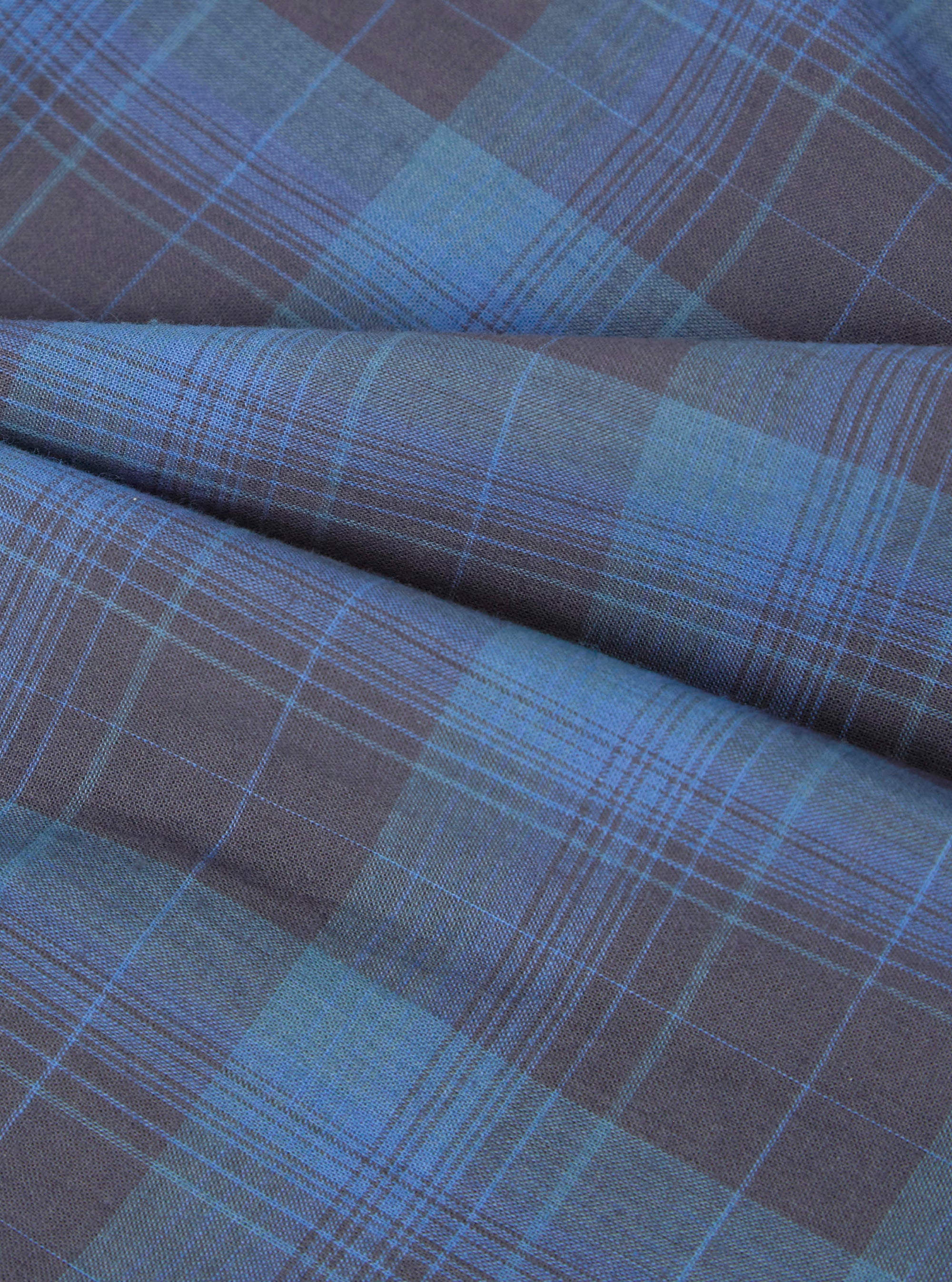Close-up of the blue and black checked fabric of the Multi Check 3 Pack Boxer Short. The soft material is draped to show texture.