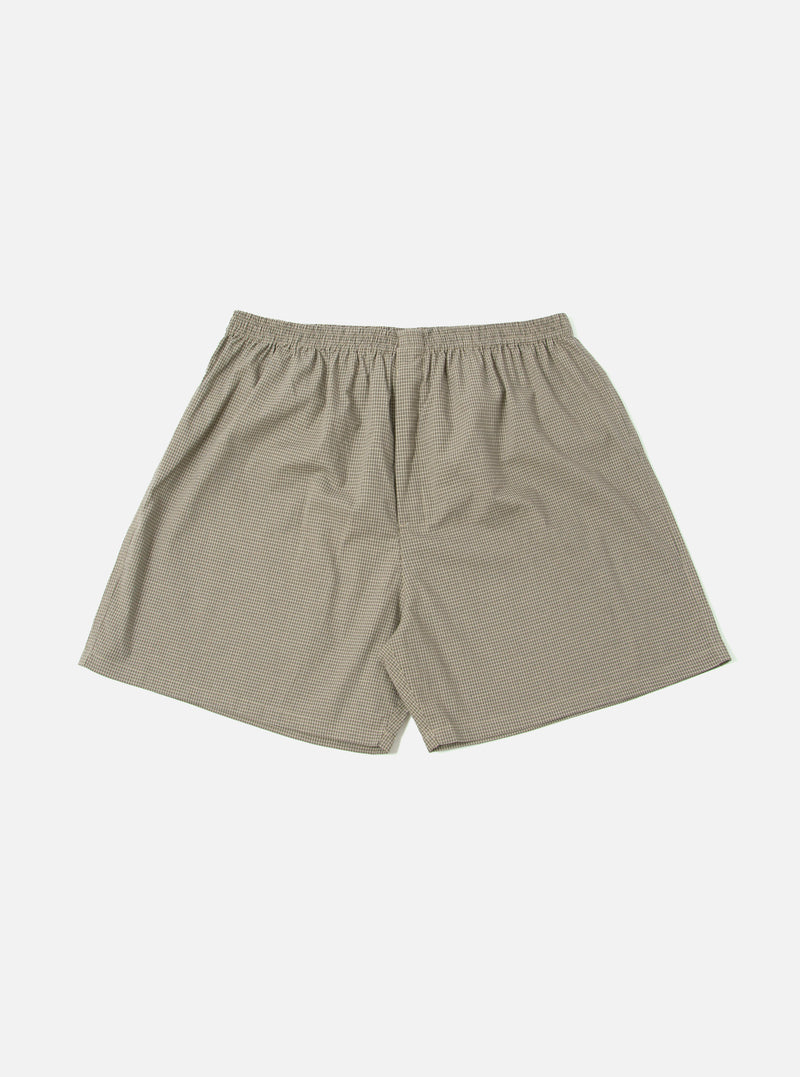 The Green Tiny Check Boxer Short, laid flat on a white background. The boxer shorts have a small green and white check pattern and an elastic waistband.