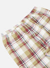 Close-up of the Red/Brown Kip Check Long Pyjama Set. The fabric is a soft, brushed cotton with a red, brown, and white check pattern. Elasticated waist. Shot on a white background.