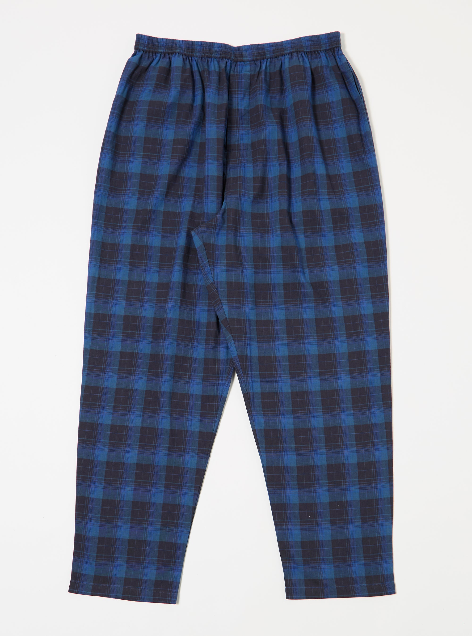 Close-up of the Navy/Blue Check Long Pyjama Set pants on a white background. The fabric is a soft, brushed cotton with an elasticated waist for a comfortable fit.