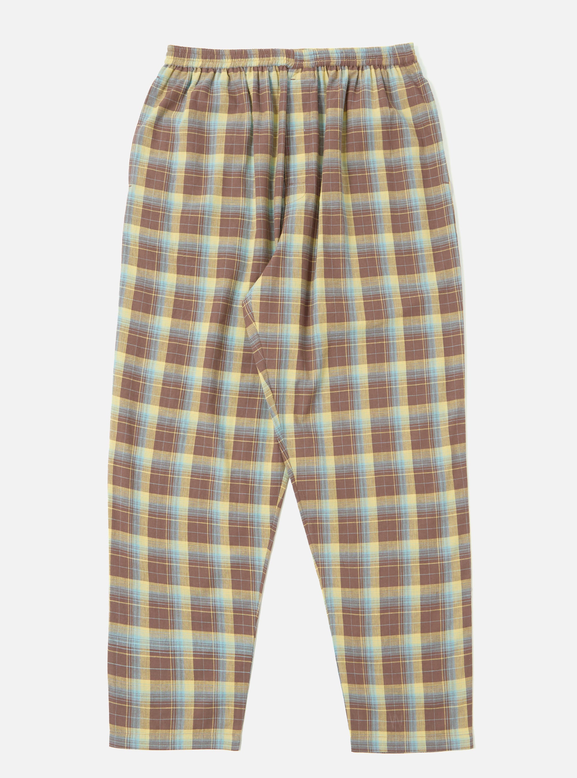 The Yellow/Brown Check Pyjama Pant is displayed on a white background. The pants have a relaxed fit and an elastic waistband, featuring a yellow, brown, and blue plaid pattern.