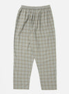 The Green PJ Plaid Pyjama Pant on a white background. The pants are a light green plaid with an elastic waistband.