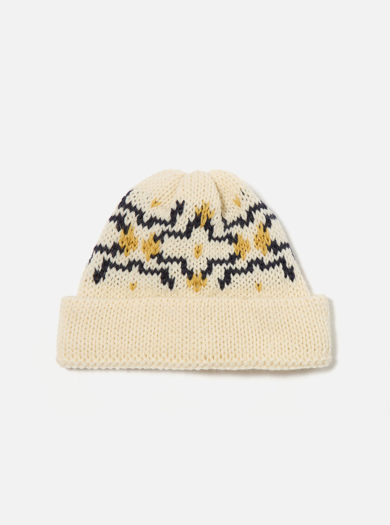 Close-up of the Ecru/Navy British Wool Short Watch Cap on a white background. The wool cap features a geometric pattern in ecru, navy, and gold.
