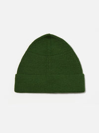Close-up of a Green Merino Knit Watch Cap on a white background. The knit texture is visible.