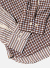 Close-up of the Brown Madison Check/Stripe Station Shirt. Features a brown, white, and blue check pattern with striped detailing. Shot on a white background.