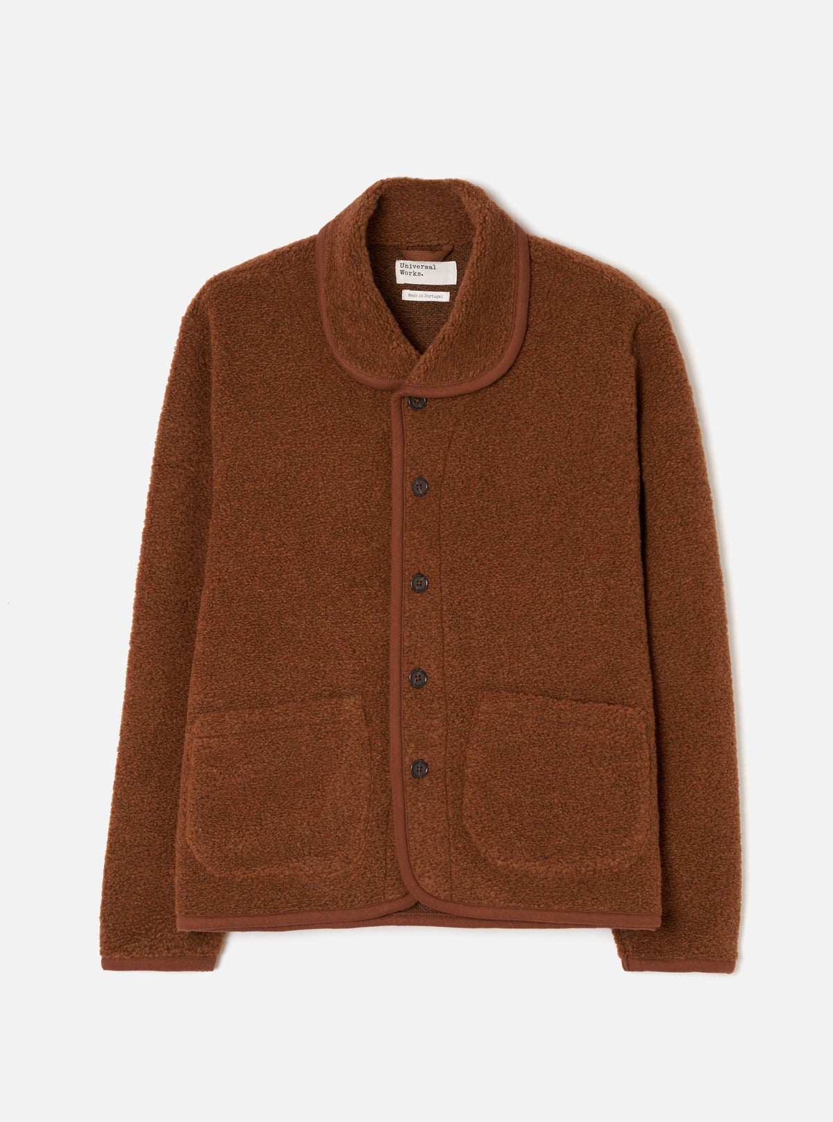 Front view of the Cumin Alvar Fleece Lancaster Jacket displayed flat against a neutral studio background. Prominent features include the vibrant cumin yellow textured fleece fabric, warm button-front closure, rounded collar, and patch pockets.