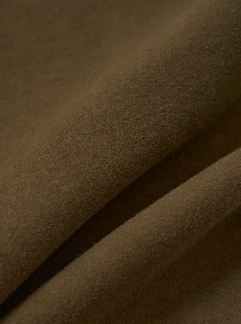 Close-up of the soft, textured moleskin fabric of the Khaki Comfort Moleskin Pleated Track Pant, showcasing its rich color and comfortable feel.