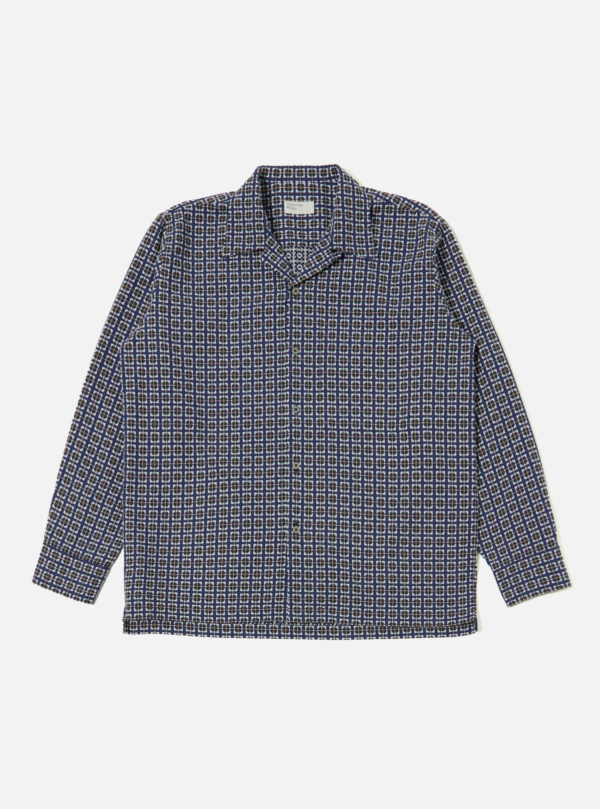 Flat lay of the Navy Oscar Cotton L/S Camp Shirt on a white background. The shirt has a navy, brown, and white geometric pattern and long sleeves.