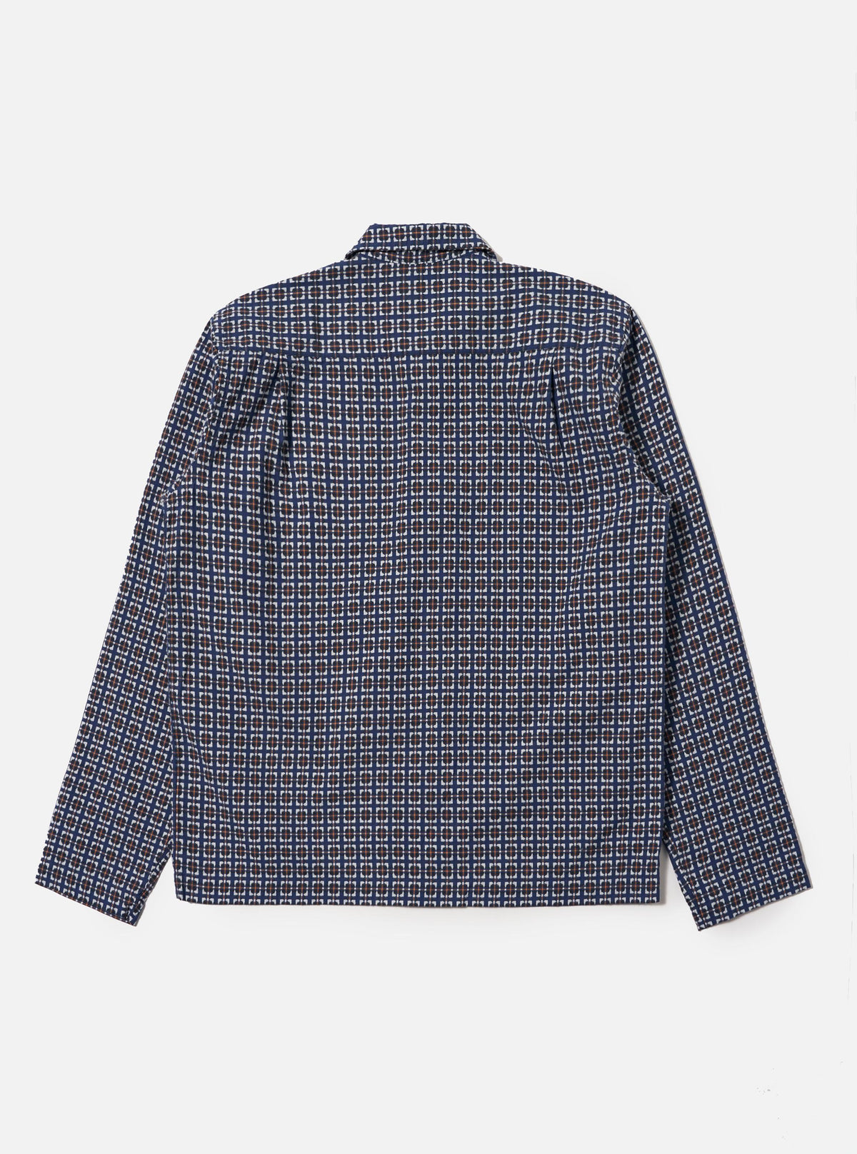 The back of a Navy Oscar Cotton Zip Shirt laid flat on a white surface. The shirt has a navy, brown, and white geometric pattern.