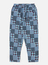 The blue brushed patchwork pyjama pant is laid flat on a white background. The pant has a patchwork design with blue, white, and red plaid patterns.