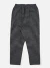 The Charcoal/Navy Seersucker Plaid Pyjama Pant on a white background. The pants have an elastic waist and a relaxed fit. The material is a textured plaid in charcoal and navy.