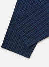 Close-up of the Indigo Plaid Long Pyjama Set. The fabric is a soft cotton blend with a classic blue plaid pattern, laid on a clean white surface.