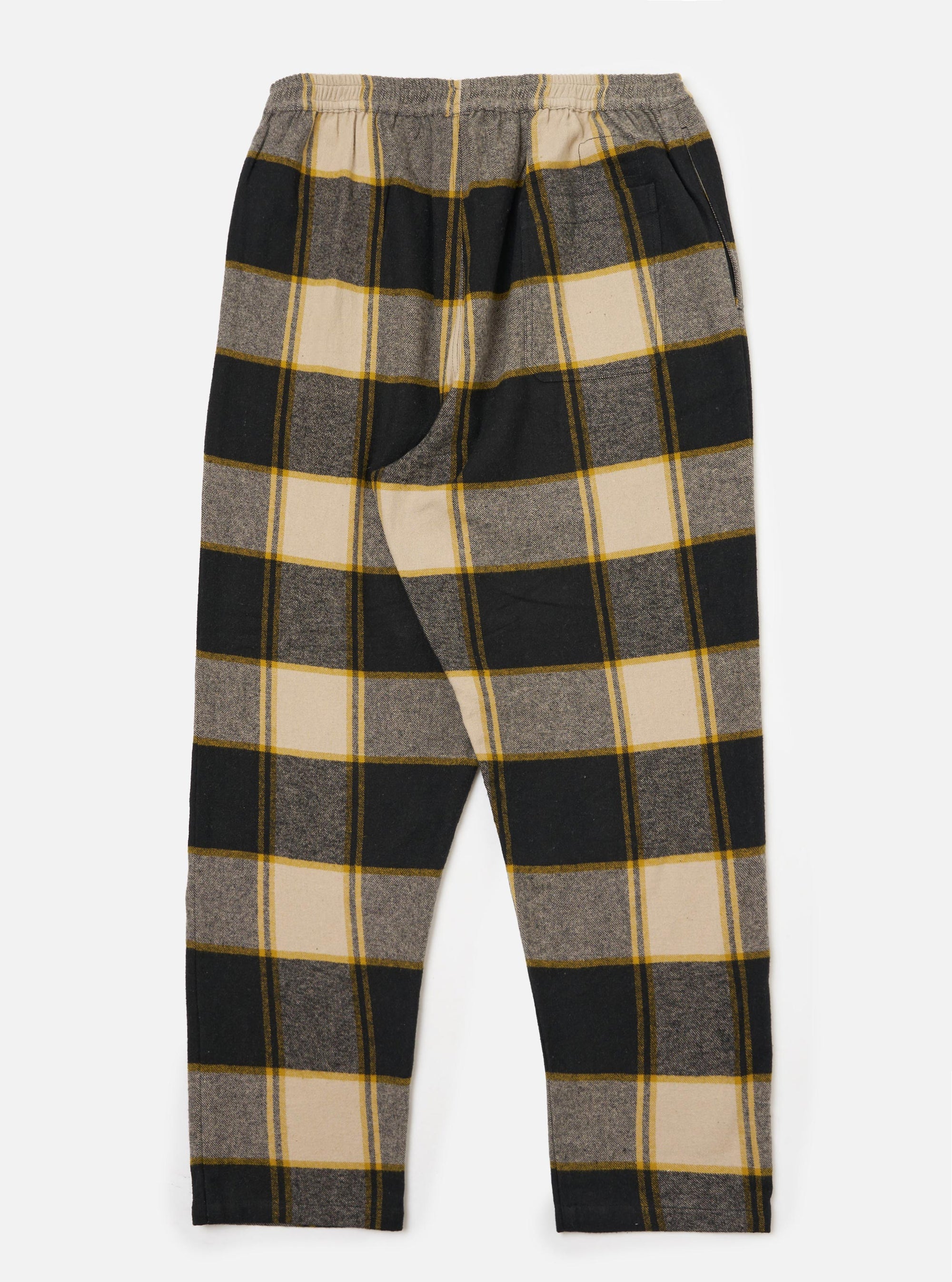 Close-up of the Black/Sand Brushed Big Check Long Pyjama Set pants on a white background. The brushed fabric features a large black, sand, and yellow check pattern.