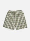 The Green Busy Plaid Short Pyjama Set on a white background. The shorts are green, black, and white plaid with an elastic waistband.
