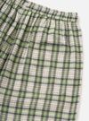 Close-up of the Green Busy Plaid Short Pyjama Set. The shorts feature a green, cream, and black plaid pattern with an elastic waistband, on a white background.