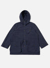 The Navy Seo Recycled Nylon Boston Parka is shown as a flat lay against a plain white background. The parka features a large adjustable hood, a full-length front zipper concealed by a buttoned placket, and two large 3D patch pockets at the hips. The lightweight, dark navy nylon fabric has a crisp texture, and the garment is designed with a relaxed, oversized fit.