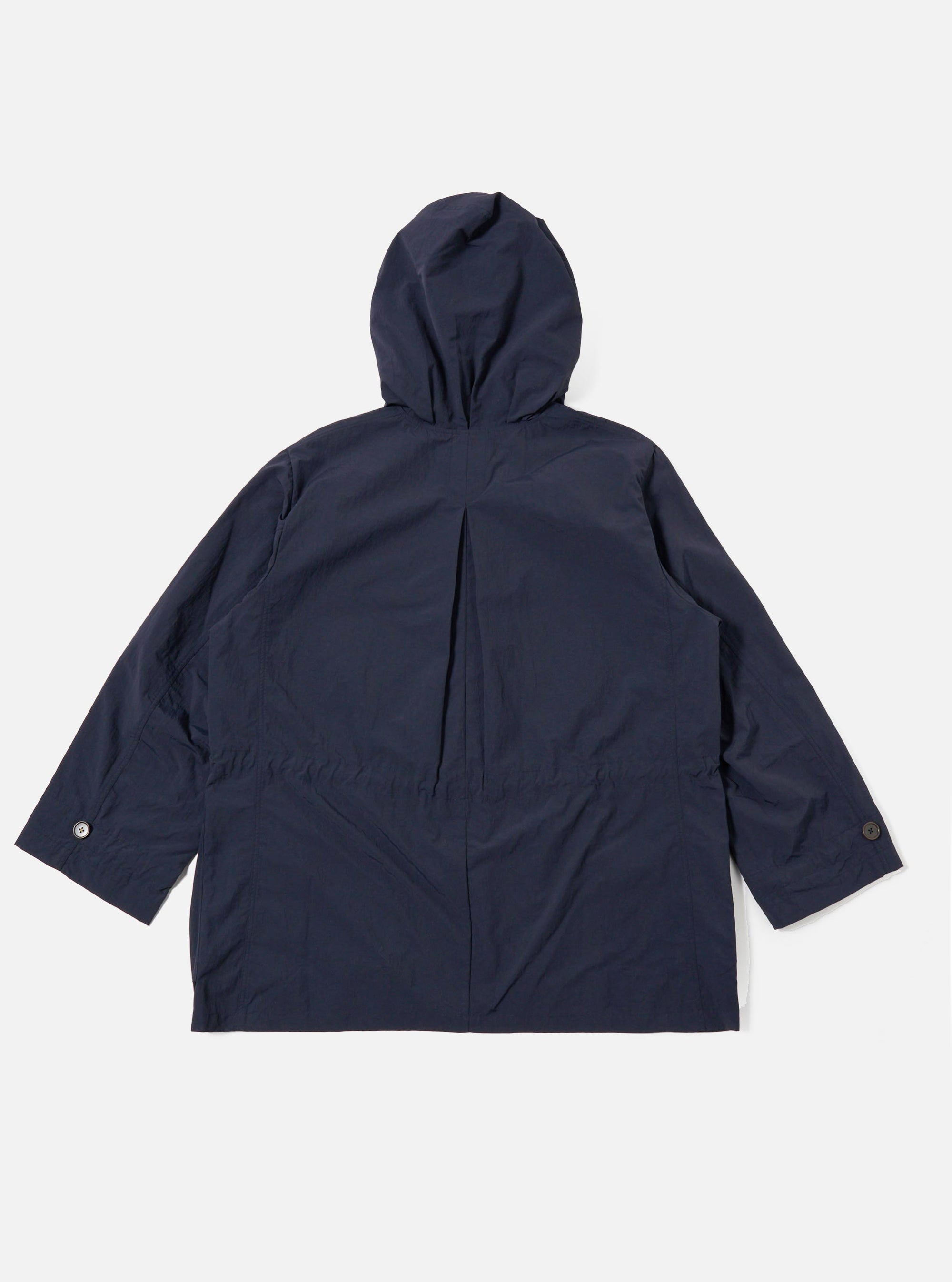 The Navy Seo Recycled Nylon Boston Parka is shown from the back as a flat lay against a plain white background. The image highlights the clean construction of the garment's rear panel, the large hood, and the smooth, technical finish of the navy blue recycled nylon fabric.