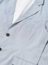 The Navy Kennedy Stripe Boston Blazer is shown from the back as a flat lay against a plain white background. The image highlights the vertical navy and white stripes, the straight hem, and the clean construction of the shoulders and back panel.