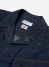 The Indigo Kaihara LT WT Denim Jungle Jacket is shown from a rear three-quarter angle as a flat lay against a plain white background. The image highlights the jacket's loose, unstructured fit, the back yoke, and the articulated two-piece sleeve construction. The indigo-dyed cotton denim fabric has a smooth, lightweight appearance with visible stitching.