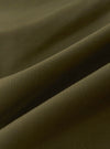 A close-up fabric swatch of the Olive Recycled Polytech City Waistcoat showing the olive green color and texture of the recycled polytech material.