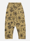 The Sand Jungle Toile Twill Oxford Pant is shown from the back as a flat lay against a plain white background. The trousers feature an all-over dark jungle toile print on a sand-colored base, with a single rear patch pocket on the right side and an elasticated waistband. The wide-leg silhouette is visible, showcasing the textured cotton twill fabric.
