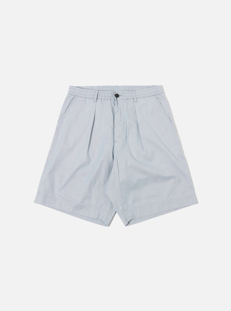 The Navy Kennedy Stripe Pleated Track Short is displayed as a flat lay against a plain white background. The shorts feature a navy blue base with a white vertical stripe pattern, an elasticated waistband with a contrasting white drawstring, and a single pleat on each leg. Two side pockets and a relaxed fit are visible.