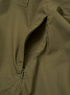 The Olive Recycled Polytech Z Tech Overshirt is shown from the back as a flat lay against a plain white background. The image highlights the clean construction of the garment's rear panel, the smooth olive green recycled polytech fabric, and a straight hem.