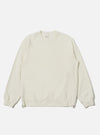 The Ecru Brush Back Sweat Billy Sweat is shown as a flat lay against a plain white background. The sweatshirt features a classic crew neckline, long sleeves with ribbed cuffs, and a ribbed hem. The fabric is a solid ecru cotton with a soft, matte finish.