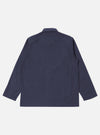 The Navy Peached Poplin Bakers Overshirt is shown from the back as a flat lay against a plain white background. The image highlights the garment's simple, straight-cut back panel, a one-piece collar, and a straight hem. The dark navy cotton fabric has a smooth, matte peached finish.