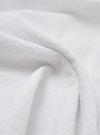 A close-up fabric swatch of the White Seersucker Double Lucky Shirt, showing the characteristic puckered and wrinkled texture of the white cotton seersucker material. No model or mannequin is present.